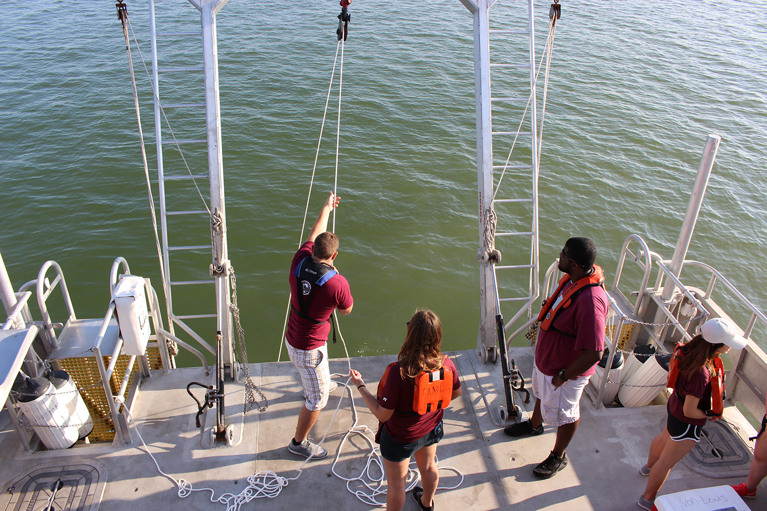 Oceanography students conducting research aboard the RV Trident Nov. 4.
