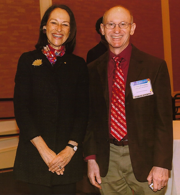 Grossman with AAAS Chair of the Board Margaret A. Hamburg after receiving his AAAS Fellows certificate and rosette during the Fellows breakfast.