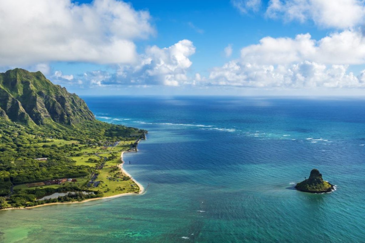 Aerial view of Kualoa Point and Chinamans Hat at Kaneohe Bay, Oahu, Hawaii. (Photo from Getty Images.)