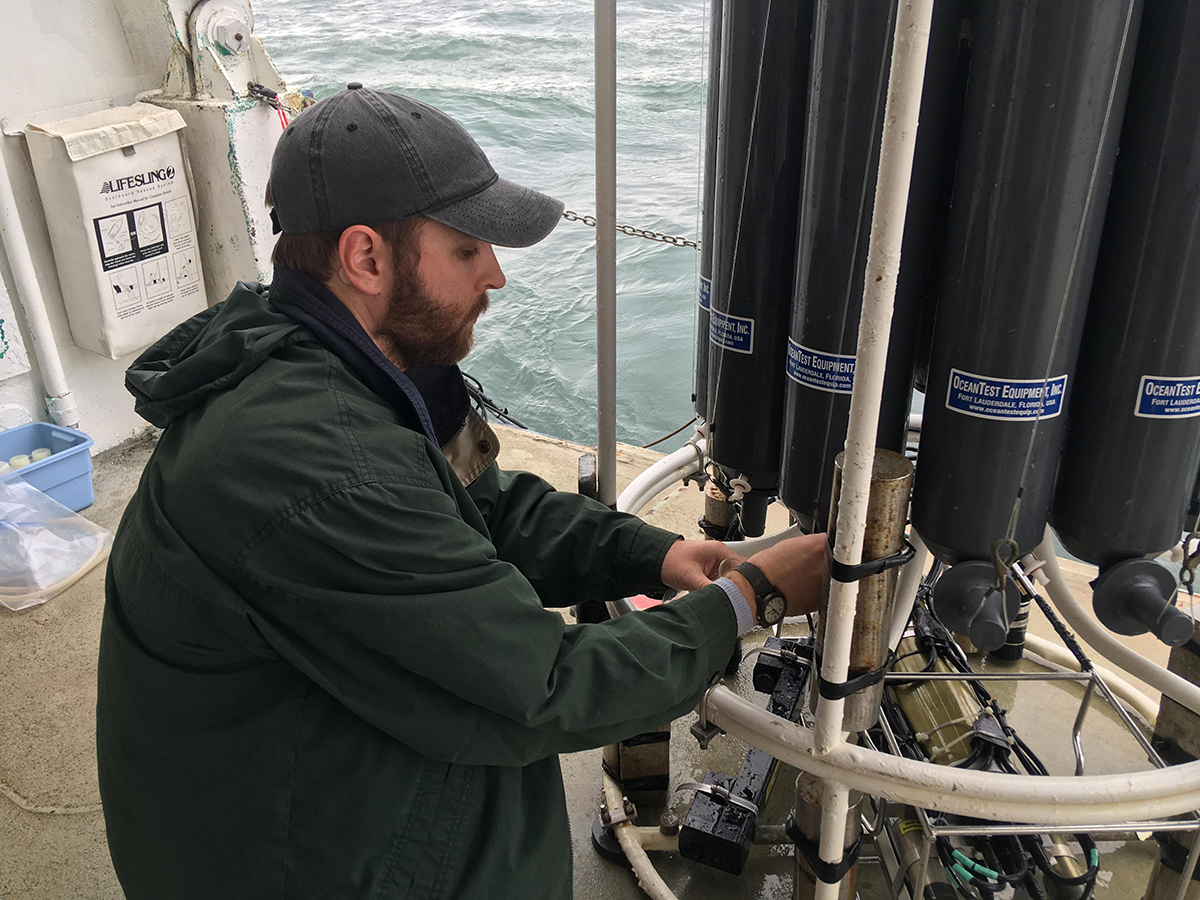 Robert Iles collecting data during a research cruise. (Photo by Robert Iles.)