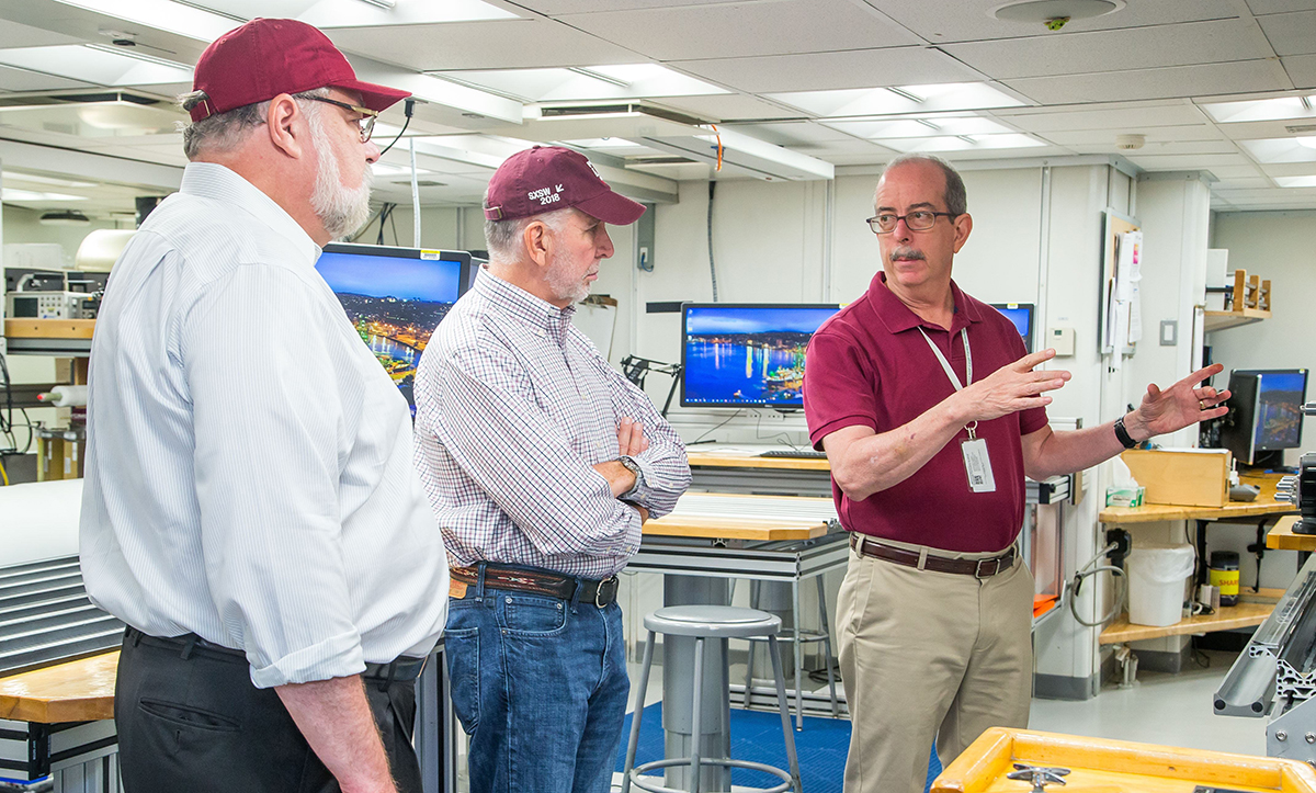 IODP JRSO Director Brad Clement conducts a tour with Vice President Barteau and President Young. (Photo by Tim Fulton, IODP JRSO.)