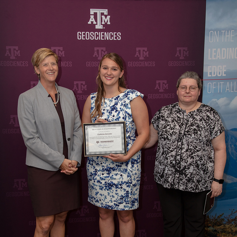 Victoria Scriven receiving the first Excellence in Oceanography Award. Pictured with Dr. Debbie Thomas, dean of the College of Geosciences, and Dr. Shari Yvon-Lewis, Head of the Department of Oceanography. (Photo by Chris Mouchyn, Texas A&M Geoscience)