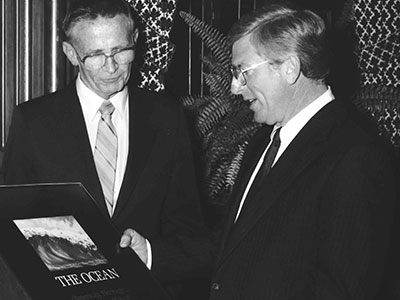 Texas Governor Mark White (right) presents a plaque to Texas Sea Grant Director Freenan D. Jennings (left) designating July 1, 1984 – July 1, 1985 the “Year of the Ocean,” affirming the states commitment to the ocean and its resources.