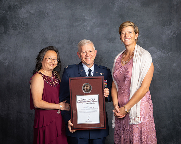 
Colonel David E. Bacot '90 received the Geosciences Distinguished Alumni Award; pictured with his wife (left), and Dr. Debbie Thomas.

