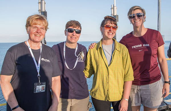 IODP Expedition 378 leadership: Ursula Röhl, Co-Chief Scientist; Lisa Crowder, Laboratory Officer; Laurel Childress, Expedition Project Manager/Staff Scientist; and Debbie Thomas, Co-Chief Scientist, aboard the JOIDES Resolution. (Photo by Tim Fulton, IODP JRSO.) 