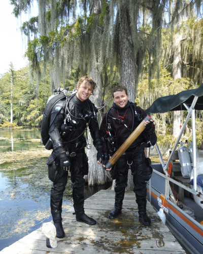 Tyler Winkler (right) and Dr. Pete van Hengstum (left) after collecting a core from Hole in The Wall Cave in Marianna, Florida. (Photo by Meghan Horgan.)