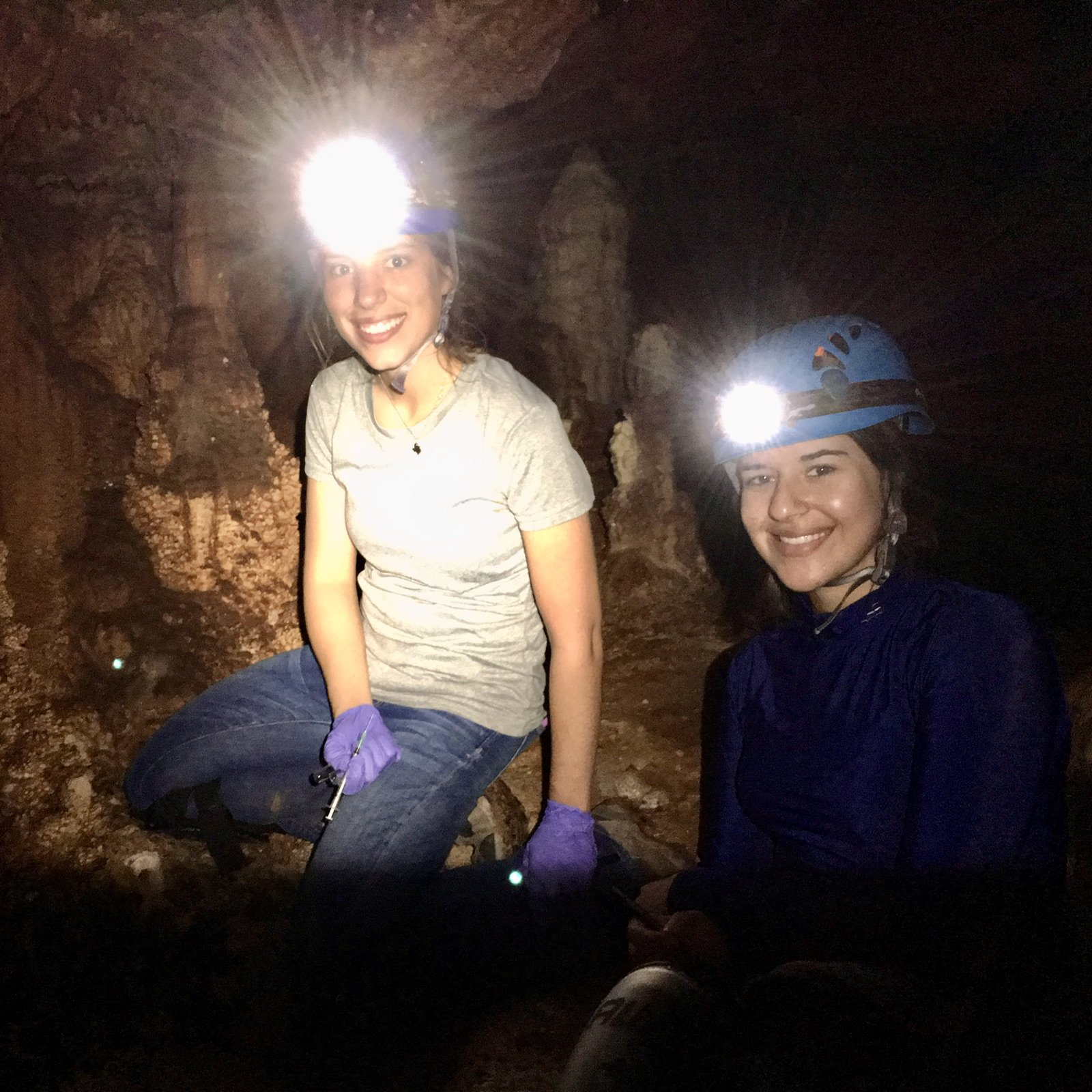 Audrey Housson ’16 and Lorraine McChesney ’16 collecting dripwaters and deploying temperature loggers in a Williamson County cave. (Photo by Chris Maupin)