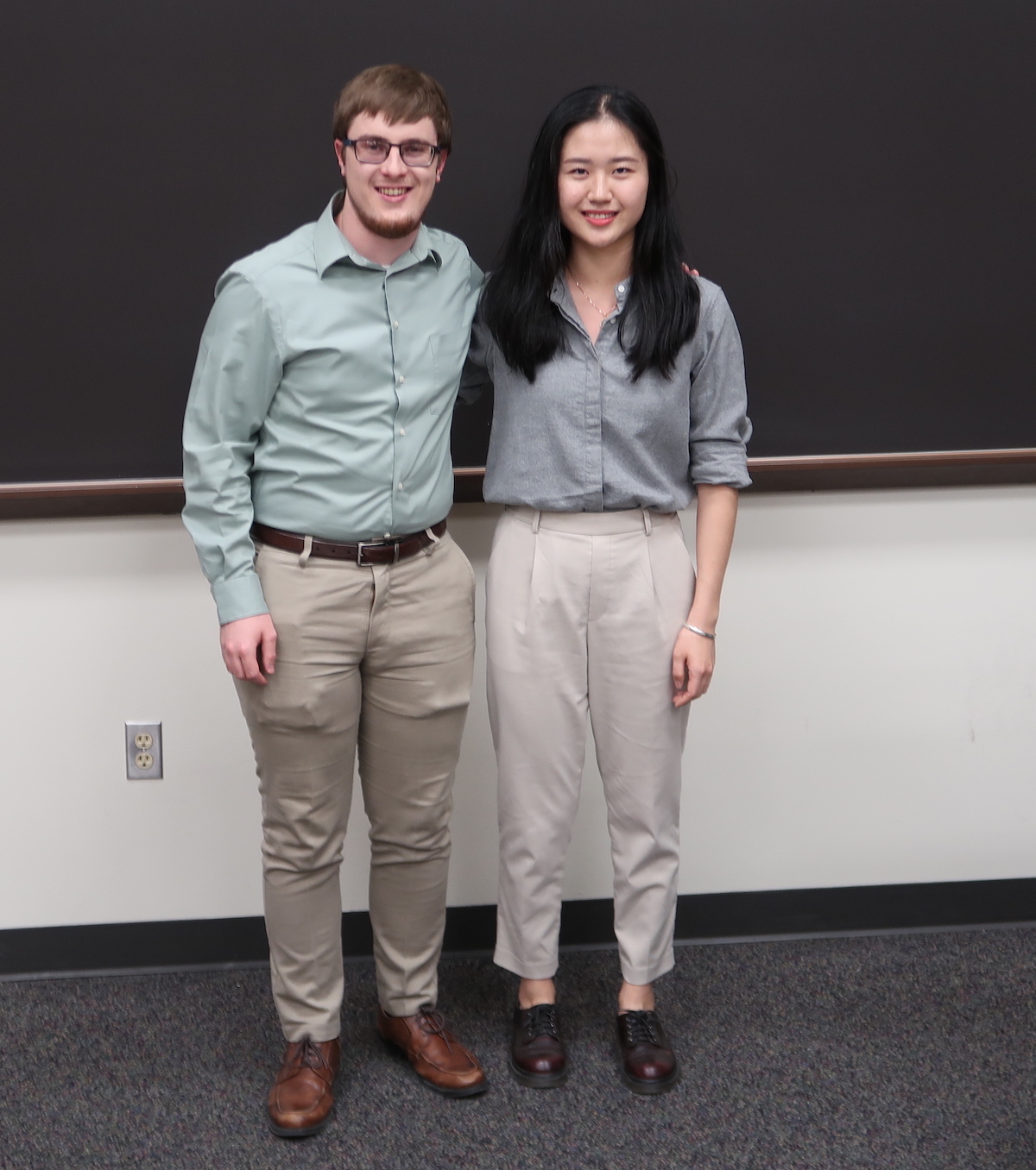 Hedanqui Bai and Matthew Brown after presenting at the Department of Atmospheric Sciences Seminar, held February 13.