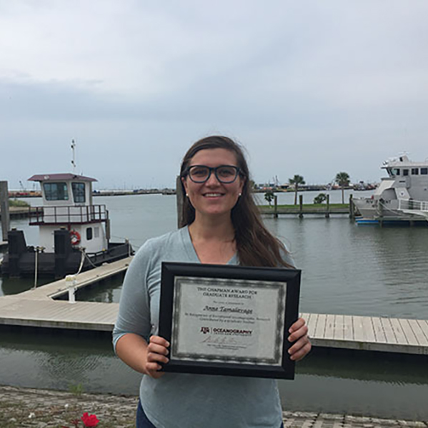 Anne Tamalavage with the certificate for the Chapman Award for Graduate Research. (Photo by Anne Tamalavage)