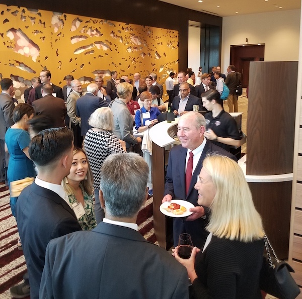 Berg-Hughes Celebration and Symposium attendees enjoying the reception at the Texas A&M Hotel and Conference Center. (Photo by Ali Snell.)