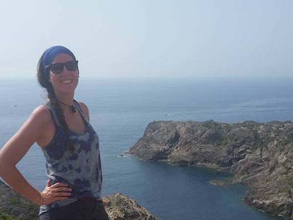 Dr. Kenderes pictured while serving as a graduate teaching assistant on a field trip to Northern Spain. Photograph taken at Cap de Creus in Girona, Spain, after a field lecture covering pseudo-boudins, pegmatites, and sheath folds in the central Pyrenees Mountains. (Photo courtesy of Kenderes.)