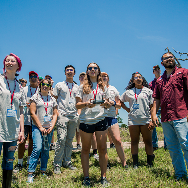 GeoX campers learning from Texas A&M Geography faculty and graduate students at the Triple JJJ Ranch in Somerville. (Photo courtesy of the Texas A&M Foundation.)