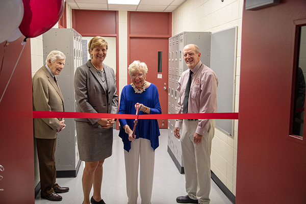 Mr. Jack Buchanan, Dean of the College of Geosciences Dr. Debbie Thomas, Mrs. Robbie Hughes, and Geology and Geophysics Department Head Dr. Mike Pope at the ribbon-cutting ceremony for the opening of the Dudley J. Hughes '51 Microscopy Learning Laboratory. (Photo by Chris Mouchyn, Texas A&M Geosciences.)