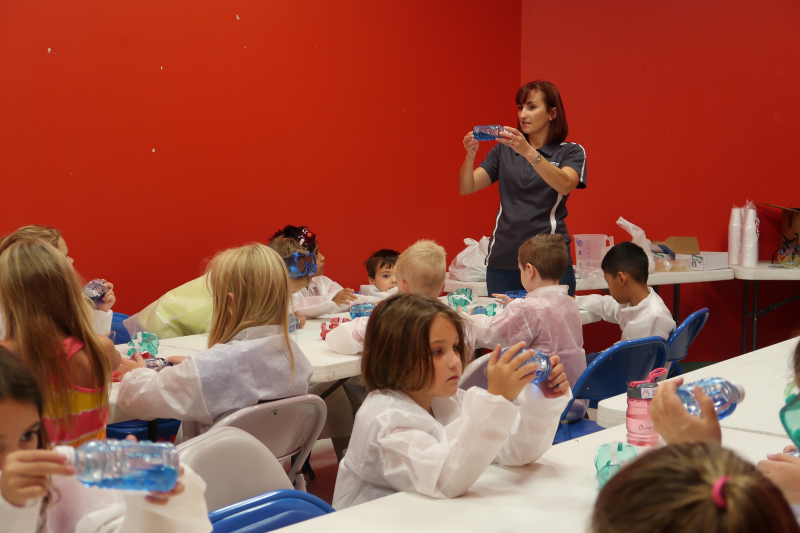 Dr. Chrissy Wiederwohl teaching students about density. (Photo courtesy of Leslie Lee.)