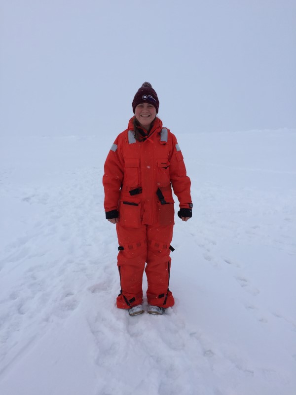 Dr. Jessica Fitzsimmons, assistant professor of Oceanography at Texas A&M, on the sea ice near the North Pole, preparing to collect samples. (Photo courtesy of Dr. Jessica Fitzsimmons.)