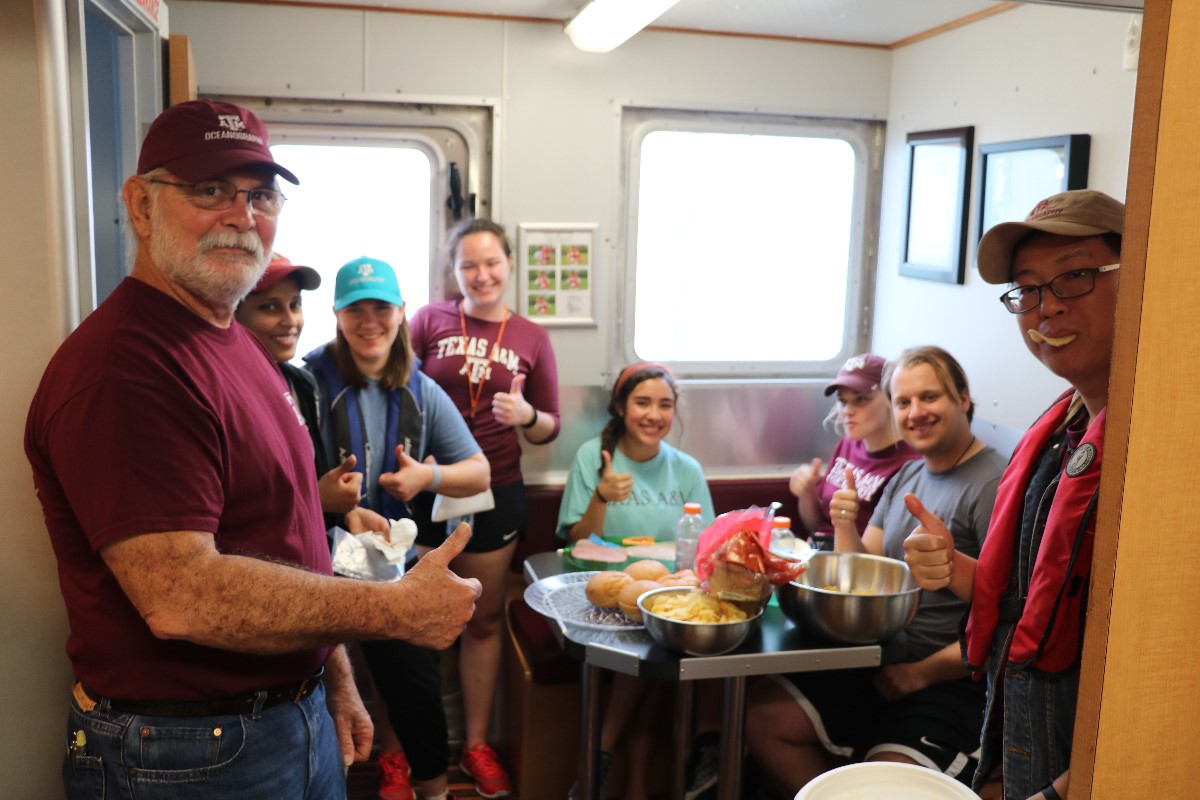 Group photo in the kitchen of R/V Trident. (Photo by: Bumsoo Kim)