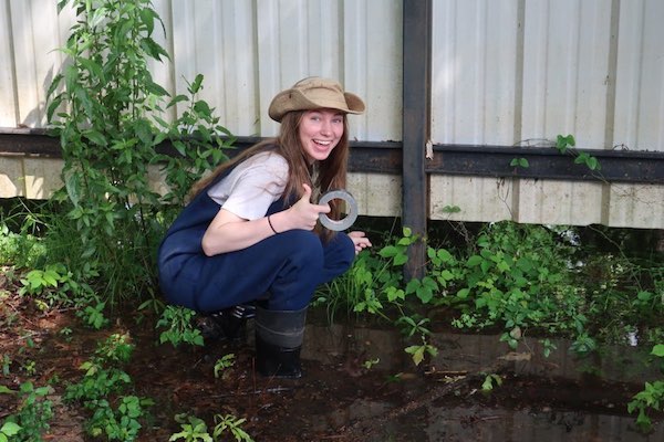 Kristina Levine ‘20 conducting field work during her internship with Geo-Watersheds Scientific. Levine is using duct tape to mark water levels along the shore of Caddo Lake, TX to create a hydrologic cross section of the shoreline. (Photo courtesy of Kristina Levine.)