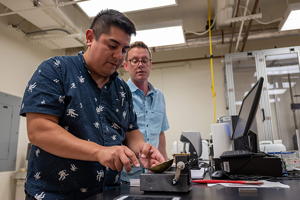 Geology & Geophysics students in the lab (Photo credit: Ali Snell)