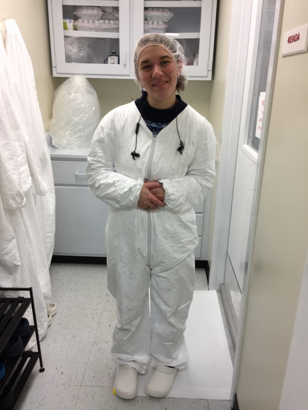 PhD Candidate Laramie Jensen at the door to the Fitzsimmons lab clean room at Texas A&M Oceanography, where the metal samples for this study were analyzed. Due to the low metal content of some of these water samples, they were highly prone to contamination from dust and human fibers, and thus they were analyzed in Fitzsimmons’ metal-free clean room. (Photo courtesy of Dr. Jessica Fitzsimmons.)