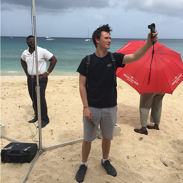 Quinton Lawton on a Barbados beach taking measurements. This took place on a sea-breeze study TAMU students conducted as part of a Meteorology study abroad on the island, in the summer of 2016.(Photo courtesy of Quinton Lawton)