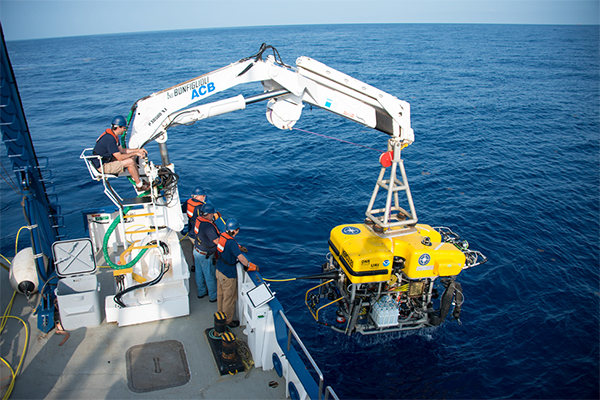 Scientists recover remotely operated vehicle ROV Hercules at the Green’s Canyon underwater oil seep. (Photo by Susan Poulton.)