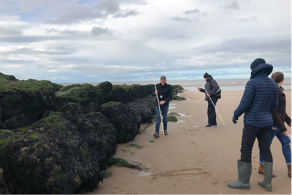 Field work on the Fylde Coast, England from Schroeder’s study abroad trip in Fall 2019. (Photo courtesy of Rachel Schroeder.)