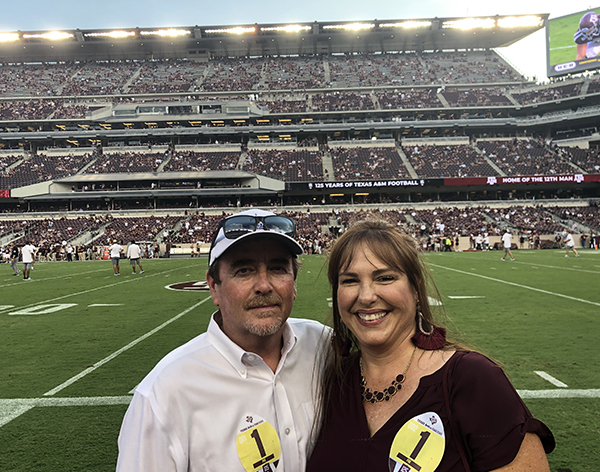 Traci ’11 and Curtis Samford ’83 at Kyle Field. (Photo courtesy of the Samfords.)