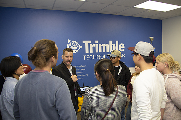 Texas A&M Geosciences students listen to demonstrations of the Trimble technology.