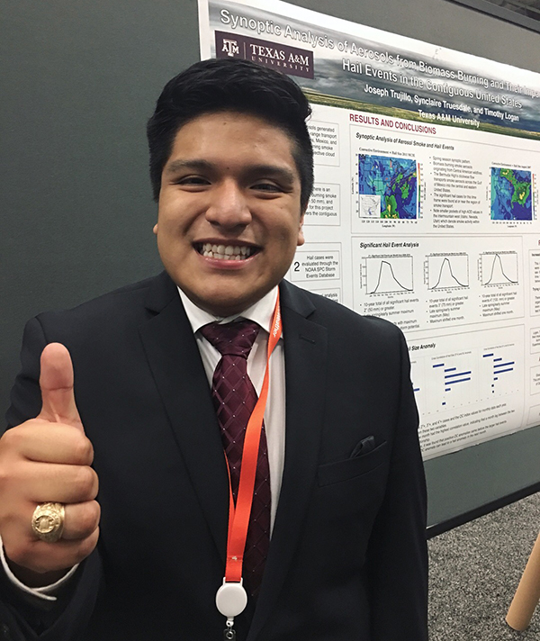 Trujillo presenting his research poster at AMS.