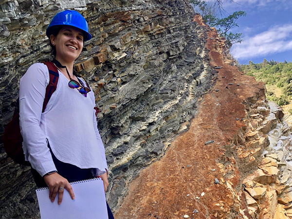 Danielle Schimmenti at the Bonarelli Level, a famous sedimentary sequence, in Furlo, Italy. (Photos courtesy of Danielle Schimmenti.)