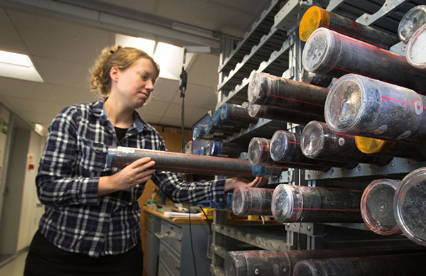 A scientist on IODP Expedition 369. (Photo by IODP JRSO.) 