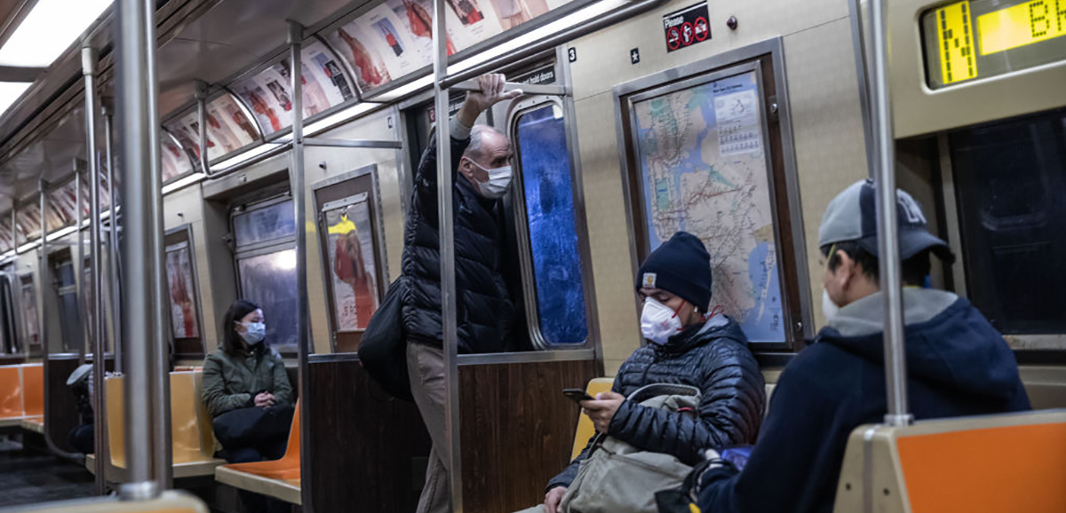 Passengers wearing face masks ride the subway on April 28, 2020 in New York City. Researchers esetimate that more than 66,000 infections were prevented by using a face mask in little over a month in New York City. (Photo: Getty Images.)