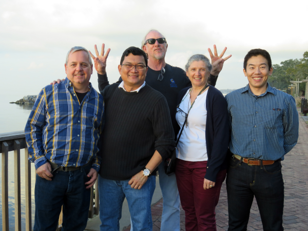 Photo of Dr. Matthew K. Howard with the GCOOS Data Management Team. From left to right, Bob Currier, Felimon Gayanilo, Dr. Matthew K. Howard, Marion Stoessel, and Dr. Shin Kobara. (Photo courtesy of Dr. Chris Simoniello.)