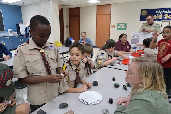 Ali and Michelle answer questions about geology from Webelos. (Photo courtesy of Andrew Armstrong.)