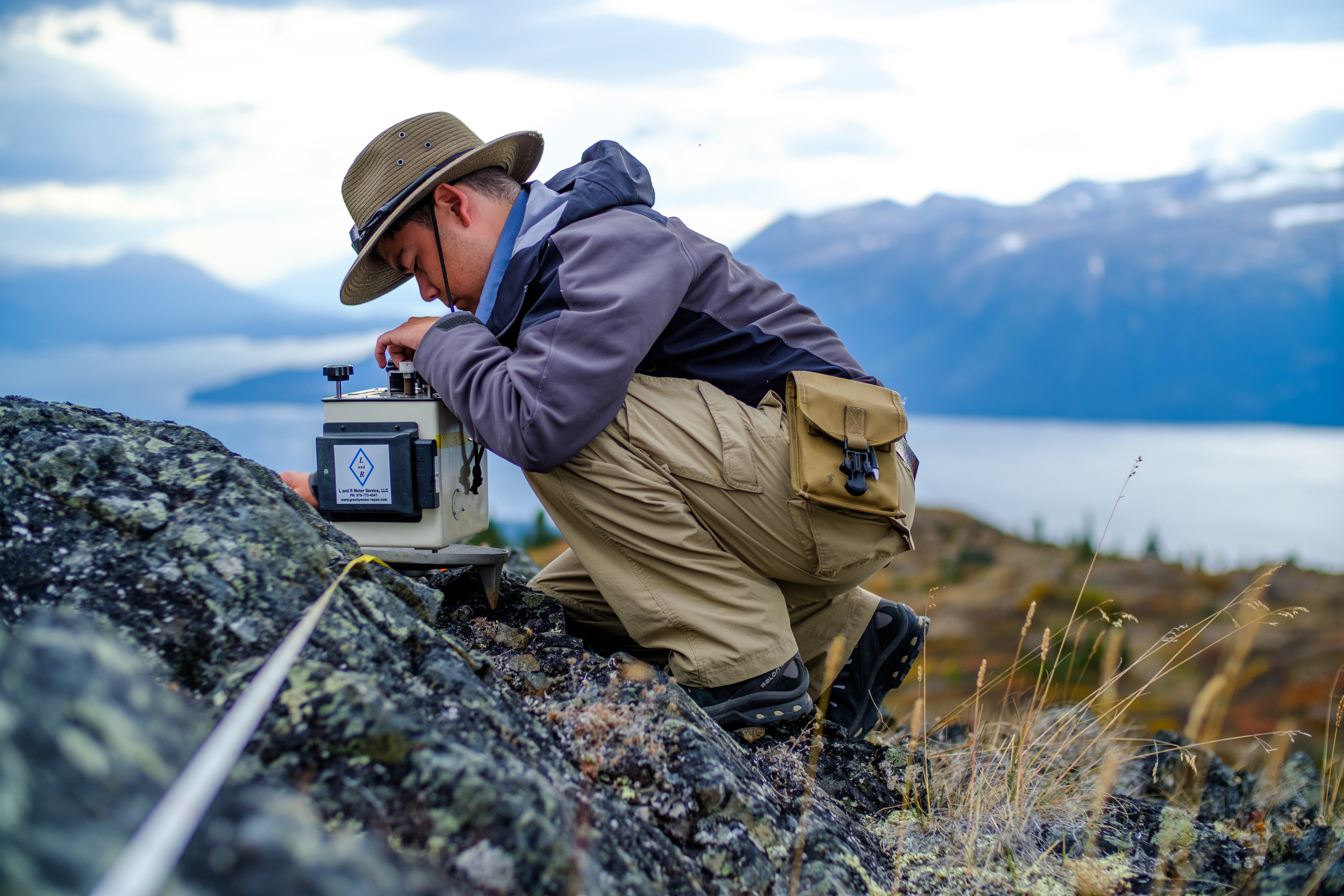 Undergraduate student, Noah Vento, uses Lacoste and Romberg Gravimeter in British Columbia, Canada field work (Photo by Patrick Fulton).