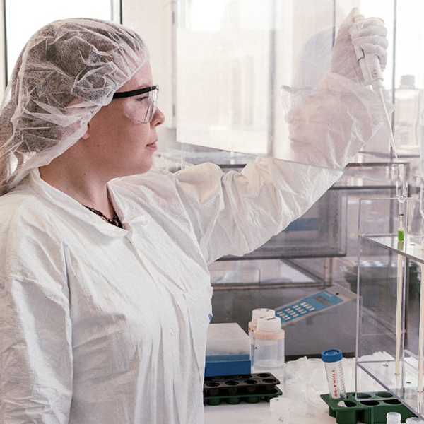 Alyssa Schultz '17, geography Ph.D. student, in the lab. (Photo by the Texas A&M Foundation.)