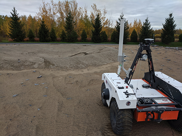 A ‘crater’ found by the student teams, and the rover, at the Canadian Space Agency's Martian Analog Terrain Facility, in Saint-Hubert, Canada. (Photo by Mission Control.)