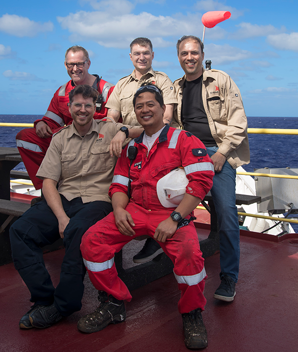 These members of the JOIDES Resolution crew recently rescued a sea turtle. (Credit: Sandra Herrmann, IODP JRSO)