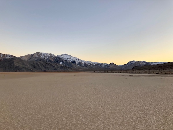 The sun sets over the Racetrack in Death Valley National Park, CA. (Photo courtesy of Claire Martin.)