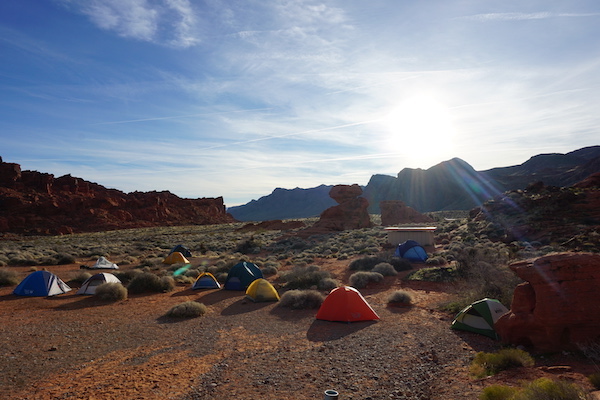 Field tents are warmed by the rising sun in the campground of the Valley of Fire State Park, NV. (Photo courtesy of Dr. Brian Balta.)