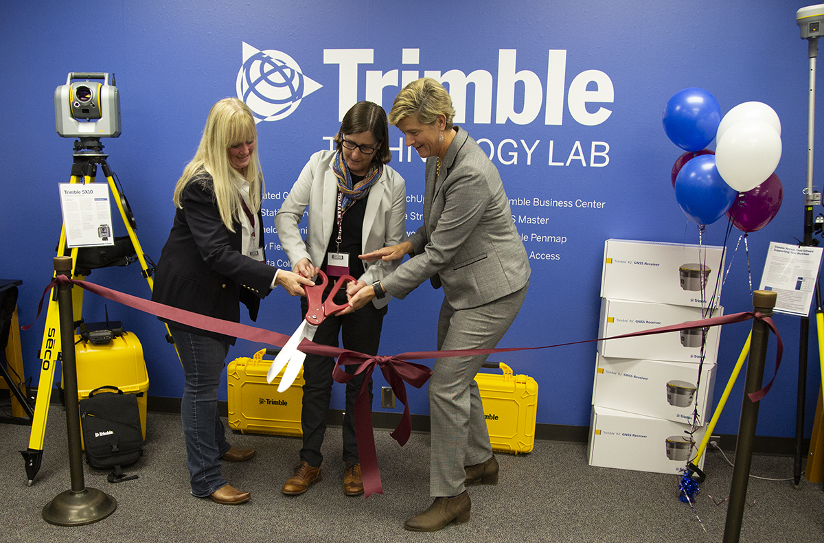 The ribbon-cutting ceremony for the lab was held Nov. 14, with Jill Urban-Karr, executive director of Trimble's Land Administration Solutions Group, Dr. Debbie Thomas, dean of the College of Geosciences, and Allyson McDuffie, Trimble's director of education and outreach. (Photos by Leslie Lee, College of Geosciences.)