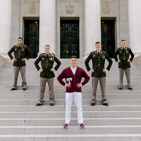 From left, 2021-22 Yell Leaders Zac Cross, Woods Johnson, Memo Salinas, Noah Ferguson and Kipp Knecht. (Photo by Camille Matzke ’21.)