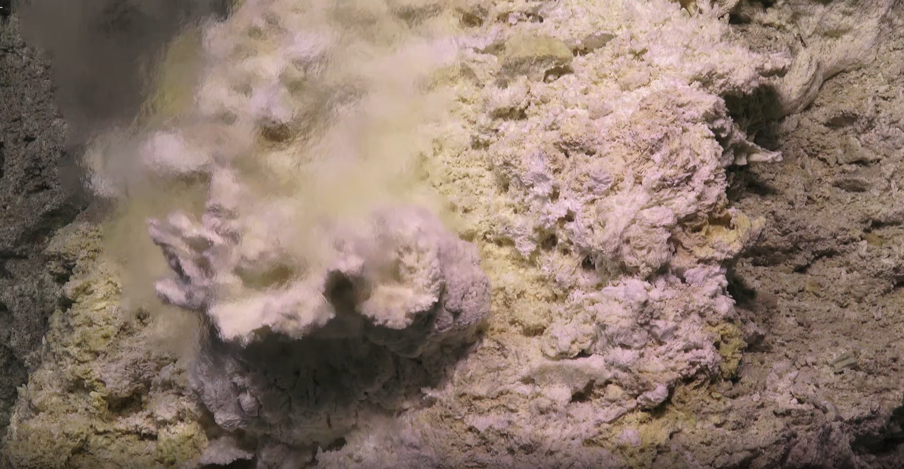Screen capture of a video log recorded with ROV Jason, onboard the R/V Atlantis from a marker at LCHF called Beehive. The actively diffusing portion of the chimney emits warmer fluid (~80-90°C), and is visible by when it comes into contact with the colder, ambient fluid. (Image Credit: Scientific Party of AT42-01 Cruise onboard the R/V Atlantis. Chief Scientist: Susan Lang. Copyright Woods Hole Oceanographic Institute.)
