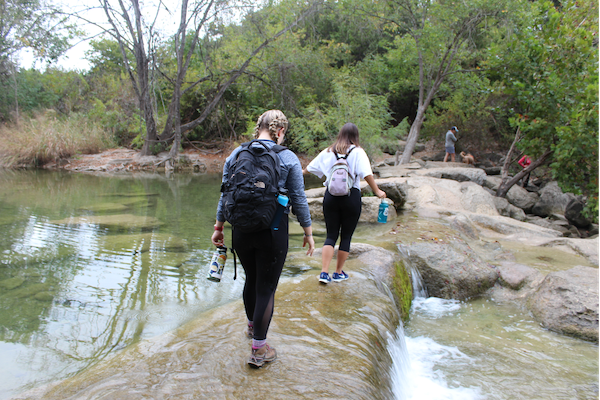 Schroeder hiking and enjoying local geology in Austin, Texas. (Photo courtesy of Rachel Schroeder.)